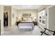 Bright bedroom featuring neutral tones, a skylight, and a walk-in closet at 645 E 9Th St, Indianapolis, IN 46202