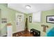 Bright entryway with a decorative glass door, wood floors, and stylish decor at 645 E 9Th St, Indianapolis, IN 46202
