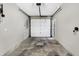 Clean, well-lit garage space with a modern door, offering secure parking and storage at 645 E 9Th St, Indianapolis, IN 46202