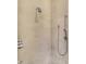 Neutral-tiled shower with multiple shower heads at 645 E 9Th St, Indianapolis, IN 46202