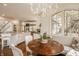 Open breakfast nook featuring banquette seating and views of the kitchen at 6560 Dawson Lake Dr, Indianapolis, IN 46220