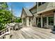 Open-air deck with outdoor dining set, perfect for entertaining and relaxing at 6560 Dawson Lake Dr, Indianapolis, IN 46220