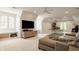 Spacious game room with a pool table, a TV, and lots of natural light at 6560 Dawson Lake Dr, Indianapolis, IN 46220