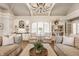 Well-lit living room with built-in shelves and a wet bar area, perfect for entertaining guests at 6560 Dawson Lake Dr, Indianapolis, IN 46220