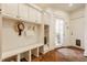 Functional mudroom features built-in storage, bench, and access to the exterior at 6560 Dawson Lake Dr, Indianapolis, IN 46220