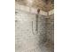 Contemporary shower with gray brick tiles and built-in shelving for toiletries at 6560 Dawson Lake Dr, Indianapolis, IN 46220