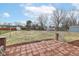 Large backyard features a patio and a spacious lawn for outdoor activities at 7322 S Sherman Dr, Indianapolis, IN 46237