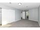 Spacious bedroom with wall-to-wall closet and easy access to the en-suite bathroom at 7322 S Sherman Dr, Indianapolis, IN 46237