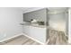 Living area features a breakfast bar and seamless flow, perfect for entertaining at 7322 S Sherman Dr, Indianapolis, IN 46237
