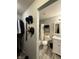 Bathroom features tub/shower with shelving and a large vanity with marble countertop at 8360 S Evening Dr, Pendleton, IN 46064