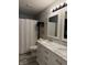 Bathroom featuring a white vanity and double mirror at 8360 S Evening Dr, Pendleton, IN 46064