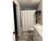 Bathroom featuring a shower-tub combo and a white vanity at 8360 S Evening Dr, Pendleton, IN 46064