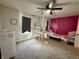 Bedroom with desk, trundle bed, ceiling fan, and closet at 8360 S Evening Dr, Pendleton, IN 46064