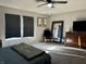 Bedroom with natural light, ceiling fan, and modern furnishings at 8360 S Evening Dr, Pendleton, IN 46064