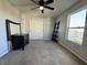 Bedroom with a large window with views of neighborhood, a closet, and carpet flooring at 8360 S Evening Dr, Pendleton, IN 46064