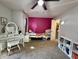 Bedroom with desk, trundle bed, ceiling fan, closet, and bookshelves at 8360 S Evening Dr, Pendleton, IN 46064