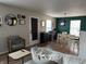 Dining room with modern table and chairs, adjacent to the kitchen at 8360 S Evening Dr, Pendleton, IN 46064