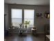 Sun-filled living room featuring windows and plant display at 8360 S Evening Dr, Pendleton, IN 46064