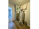 Utility room with furnace and water heater and entry to other parts of the home at 8360 S Evening Dr, Pendleton, IN 46064