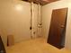 This basement features clean walls, concrete floor, and basic utilities, awaiting customization at 8940 Black Hawk Ln, Indianapolis, IN 46234