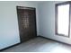 Comfortable bedroom features updated floors, window with natural light and closet at 8940 Black Hawk Ln, Indianapolis, IN 46234