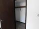 Bedroom closet with ample storage and a clean, well-lit interior, ready for organization at 8940 Black Hawk Ln, Indianapolis, IN 46234