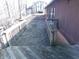Large wooden deck with railings, perfect for outdoor entertaining at 8940 Black Hawk Ln, Indianapolis, IN 46234
