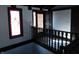 Grand entryway featuring decorative window, dark trim and a carved front door at 8940 Black Hawk Ln, Indianapolis, IN 46234