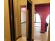 View of the living room shows pink arches and neutral walls at 8940 Black Hawk Ln, Indianapolis, IN 46234