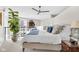 Bedroom features an open design, comfortable bed, and views of the outside at 932 N Broadway St # 1, Indianapolis, IN 46202