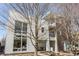 Modern home exterior with large windows and inviting architectural design at 932 N Broadway St # 1, Indianapolis, IN 46202