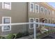 Building exterior features a neutral color scheme with window details, offering a pleasing aesthetic from the outside at 932 N Broadway St # 1, Indianapolis, IN 46202