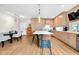 Modern kitchen with a large island, stainless steel appliances, and sleek, minimalist cabinetry at 932 N Broadway St # 1, Indianapolis, IN 46202