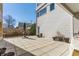 Spacious patio area with tile flooring, perfect for outdoor entertaining or relaxing in a private backyard setting at 932 N Broadway St # 1, Indianapolis, IN 46202