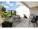 A large outdoor patio area for entertaining with ample seating and a grill at 932 N Broadway St # 1, Indianapolis, IN 46202