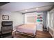 Multipurpose room with a pull-down bed unit and a sleek built-in shelving system at 9505 Bay Vista W Dr, Indianapolis, IN 46250