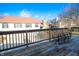 Spacious deck with wooden flooring and railings, offering an outdoor seating area with views of the backyard at 9505 Bay Vista W Dr, Indianapolis, IN 46250