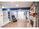 Spacious living room with stone fireplace, built-in shelving, and comfortable seating at 9505 Bay Vista W Dr, Indianapolis, IN 46250