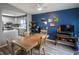 Open concept living space with dining area, updated kitchen, and view of a naturally lit living room at 9505 Bay Vista W Dr, Indianapolis, IN 46250