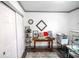 Office space featuring ample natural light and a decorative bookshelf at 9505 Bay Vista W Dr, Indianapolis, IN 46250