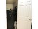 View of a storage area or closet featuring a gun safe for secure storage solutions at 9505 Bay Vista W Dr, Indianapolis, IN 46250