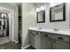 Bathroom showcasing double vanity, modern fixtures, and neutral tones at 10326 Haag Dr, Brownsburg, IN 46112