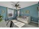 Bright bedroom with a desk, natural light, and a cozy daybed at 10326 Haag Dr, Brownsburg, IN 46112