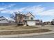 Charming two-story home featuring a two-car garage, a welcoming front door, and a well-maintained lawn at 10326 Haag Dr, Brownsburg, IN 46112