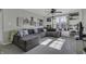 Cozy living room featuring a large sectional sofa, built-in shelves, and plenty of natural light at 10326 Haag Dr, Brownsburg, IN 46112