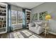 Inviting room featuring hardwood floors, lots of natural light, and custom built in shelving at 10326 Haag Dr, Brownsburg, IN 46112