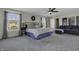Spacious main bedroom showcasing a cozy lounge area, large bed, and ample natural light at 10326 Haag Dr, Brownsburg, IN 46112