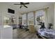 Bright sunroom featuring large windows, exercise equipment, and views of the backyard at 10326 Haag Dr, Brownsburg, IN 46112
