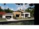 Modern house with a two car garage, light wood features and beautiful landscaping at 10440 Somerford Rdg, Zionsville, IN 46077