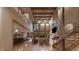 Bright living room with fireplace, hardwood floors, soaring ceilings and a view at 10440 Somerford Rdg, Zionsville, IN 46077